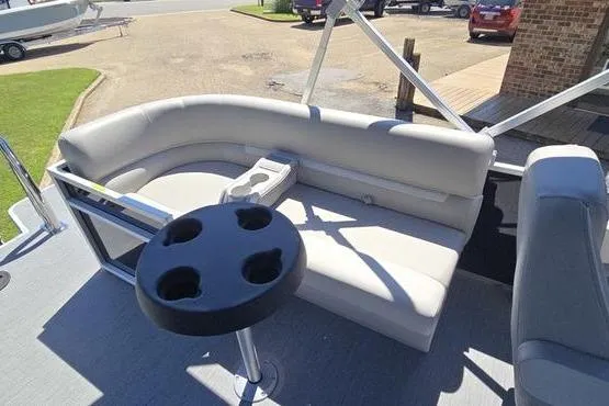 Slide: The Image of 2026 Godfrey Xperience 2286 SBX Sport Tube boat interior with seating and cup holders. - 15