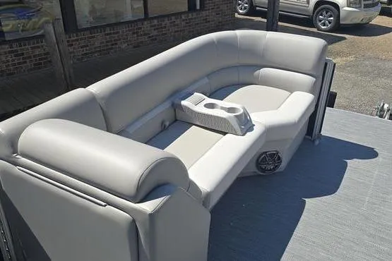 Slide: The Image of 2026 Godfrey Xperience 2286 SBX Sport Tube boat interior with plush seating and cup holders. - 7