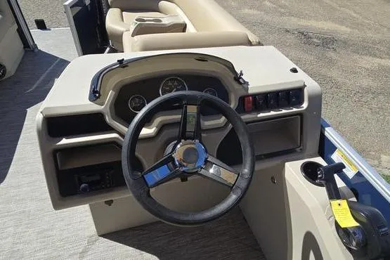 Slide: The Image of Steering console of 2026 Godfrey Xperience 2286 SFLX Sport Tube boat, featuring modern controls. - 6