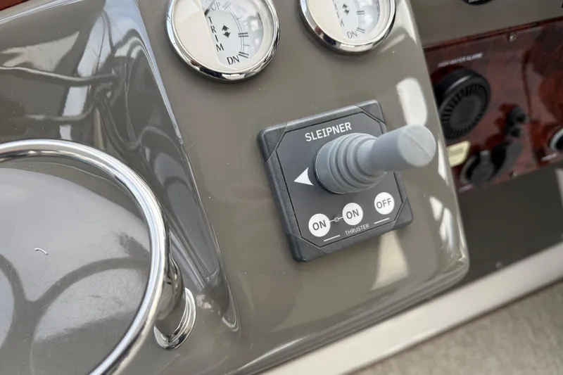 Slide: The Image of Control panel of a 2007 Regal Commodore 3760 IO boat with Sleipner thruster switch. - 5