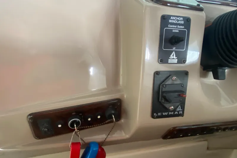 Slide: The Image of Control panel of a 2002 Rinker 342 Fiesta Vee boat with anchor windlass switch. - 20