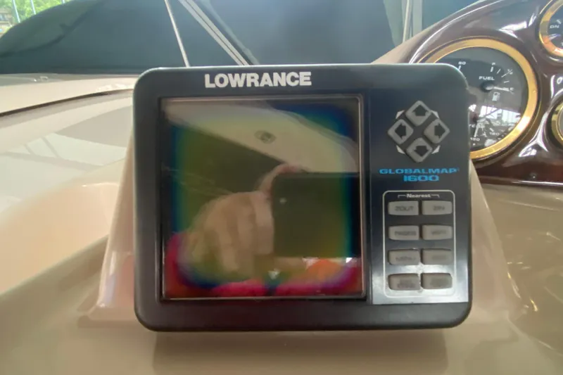 Slide: The Image of Lowrance GlobalMap 1600 GPS on 2002 Rinker 342 Fiesta Vee dashboard. - 22