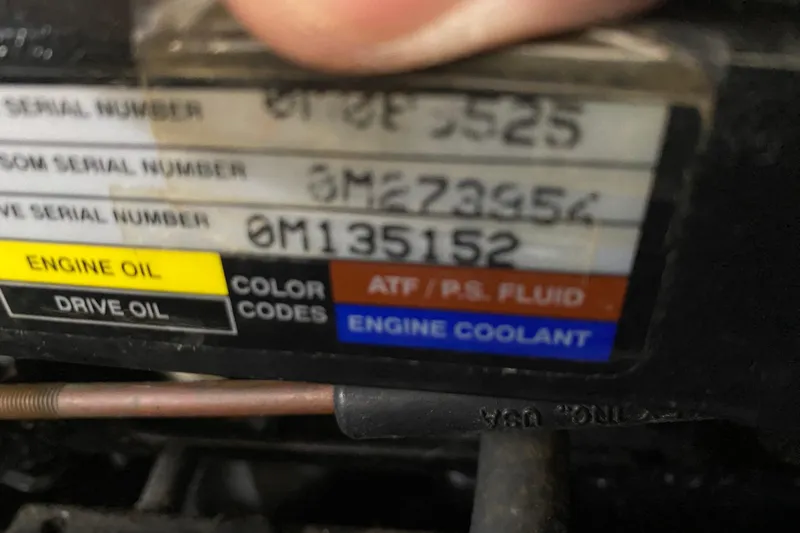 Slide: The Image of Label with serial numbers and color codes on a 2002 Rinker 342 Fiesta Vee. - 34