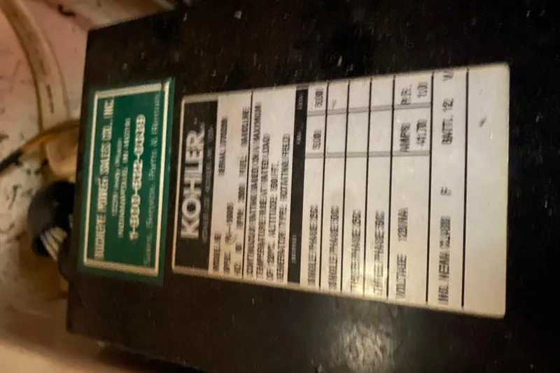 Slide: The Image of Label on Kohler generator inside 2002 Rinker 342 Fiesta Vee boat. - 37