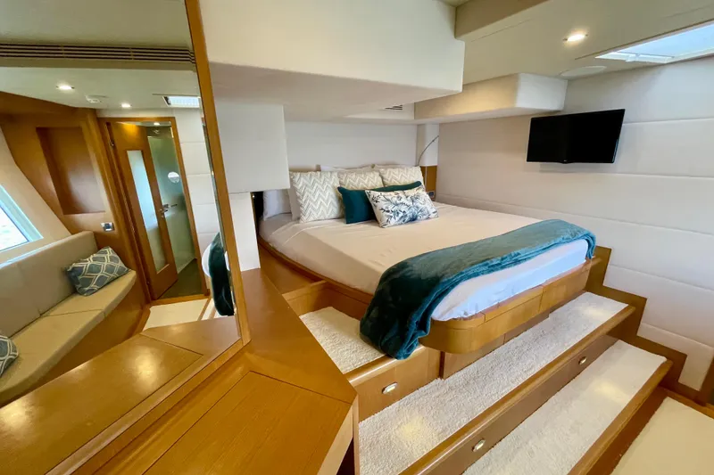 Slide: The Image of Luxurious bedroom interior of 2018 Serenity 64 yacht with elegant bedding and modern decor. - 73