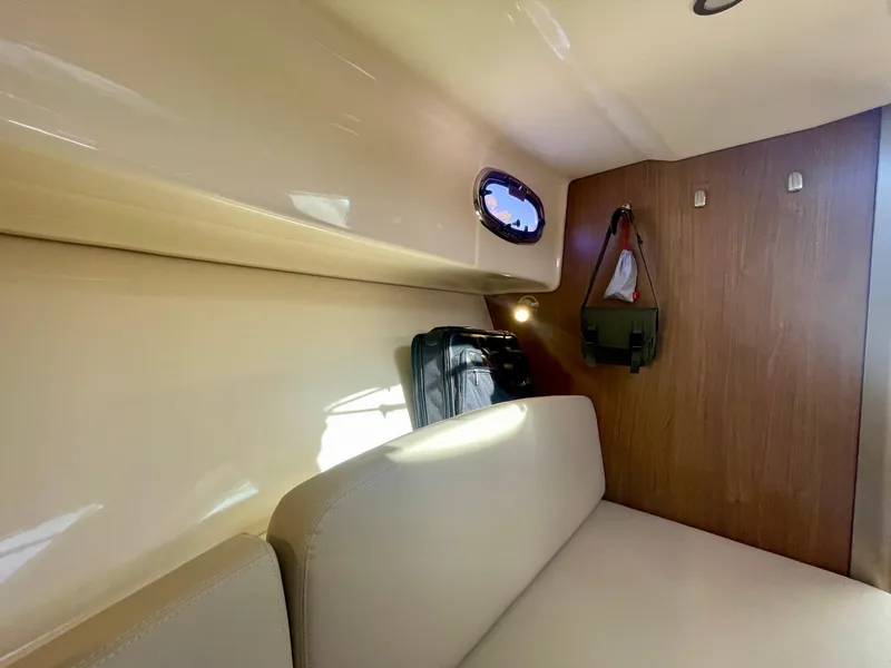 Slide: The Image of Interior cabin of 2018 Boston Whaler 315 Conquest with seating and storage. - 40