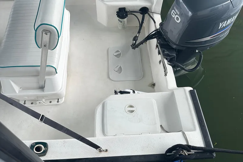 Slide: The Image of 2006 Key Largo 160 Center Console boat with Yamaha 60 engine, interior view. - 9