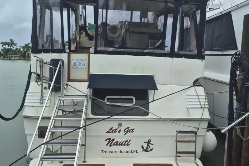 Slide: The Image of 1986 Sea Ray 410 Aft Cabin boat docked at Treasure Island, FL. - 1