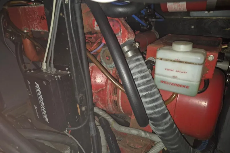 Slide: The Image of Engine compartment of 1986 Sea Ray 410 Aft Cabin with Westerbeke engine coolant system. - 13