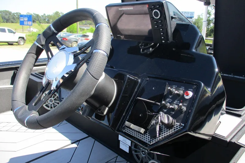 Slide: The Image of Steering console of 2026 Avid 20 Vertex boat with control panel and display. - 13