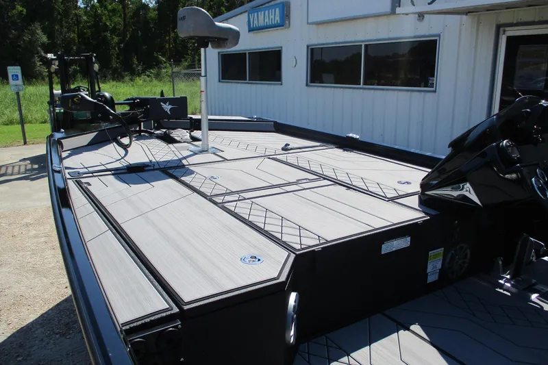 Slide: The Image of 2026 Avid 20 Vertex boat deck with modern design and fishing equipment. - 5