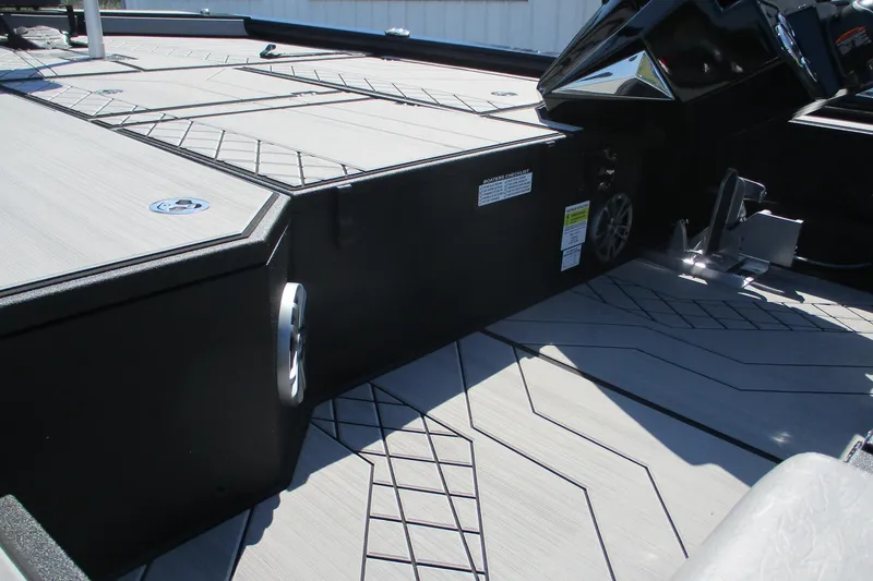 Slide: The Image of 2026 Avid 20 Vertex boat interior with sleek, modern deck design and storage compartments. - 6