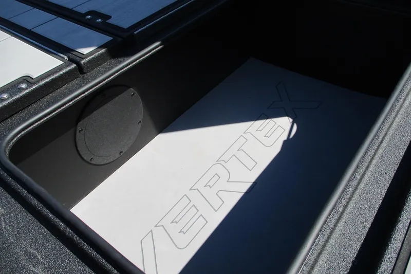 Slide: The Image of Storage compartment of 2026 Avid 20 Vertex boat, featuring "Vertex" branding. - 9