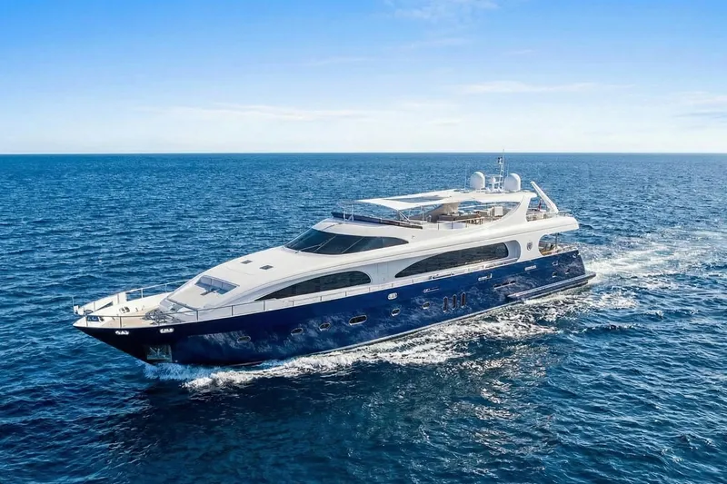The Image of Luxurious 2011 Mengi Yay 115 MY yacht cruising on open sea under clear blue sky. - 0