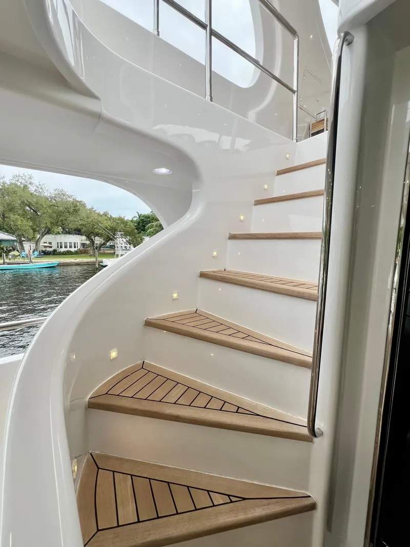 Slide: The Image of Elegant spiral staircase on 2011 Mengi Yay 115 MY yacht with wooden steps. - 24