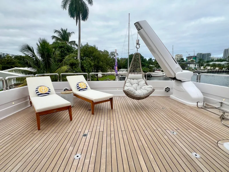 Slide: The Image of Luxury yacht deck with lounge chairs and hanging chair, Mengi Yay 115 MY, 2011 model. - 28