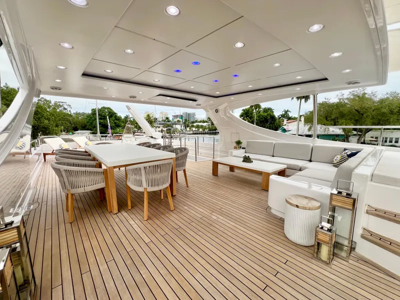 Slide: The Image of Luxurious 2011 Mengi Yay 115 MY yacht deck with elegant seating and dining area. - 30