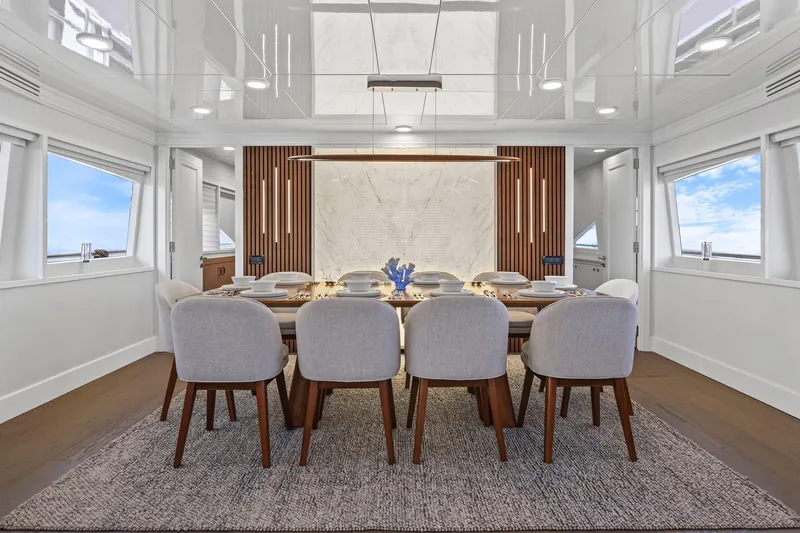 Slide: The Image of Luxurious dining area on 2011 Mengi Yay 115 MY yacht, featuring elegant decor and modern furnishings. - 42