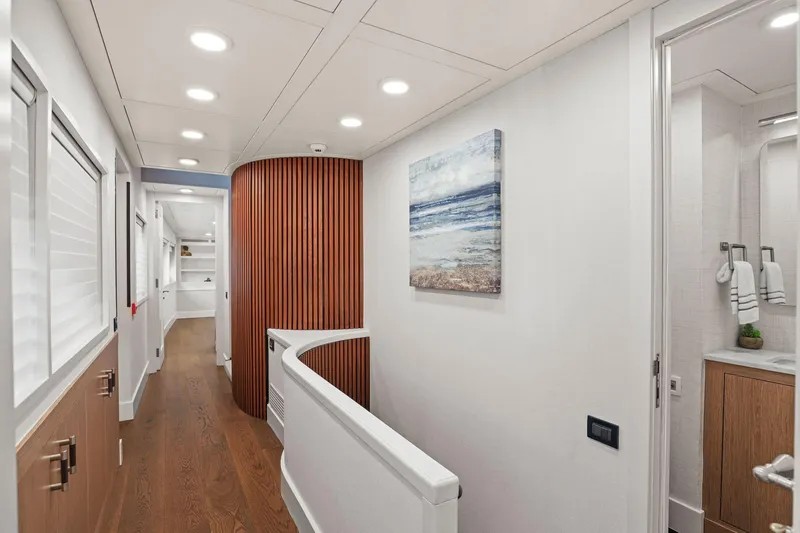 Slide: The Image of Luxurious hallway on 2011 Mengi Yay 115 MY yacht with modern decor and artwork. - 50