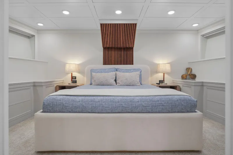 Slide: The Image of Luxurious bedroom interior on 2011 Mengi Yay 115 MY yacht, featuring elegant decor and ambient lighting. - 73