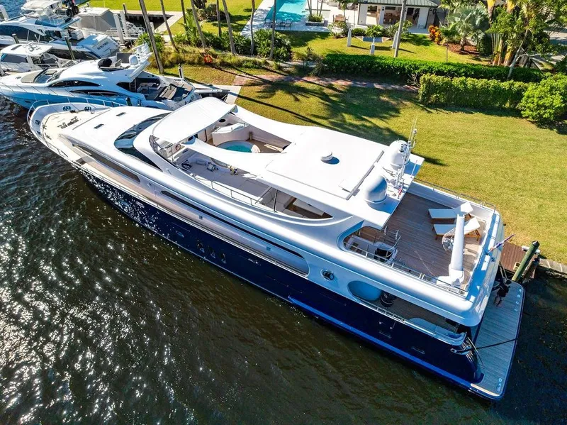 Slide: The Image of Luxurious 2011 Mengi Yay 115 MY yacht docked by lush waterfront. - 8