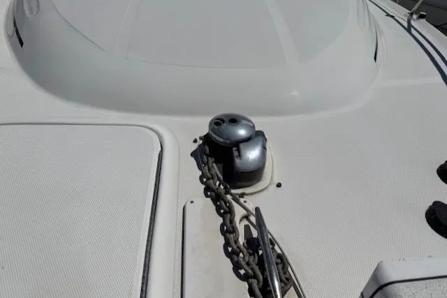 Slide: The Image of Deck of 2000 Sea Ray 410 Express Cruiser with anchor chain and winch. - 1