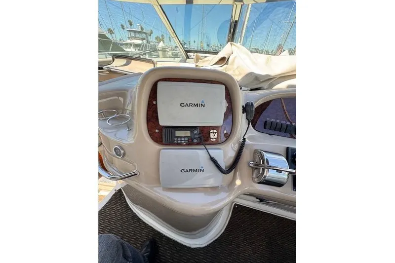 Slide: The Image of Helm of 2000 Sea Ray 410 Express Cruiser with Garmin navigation system. - 15