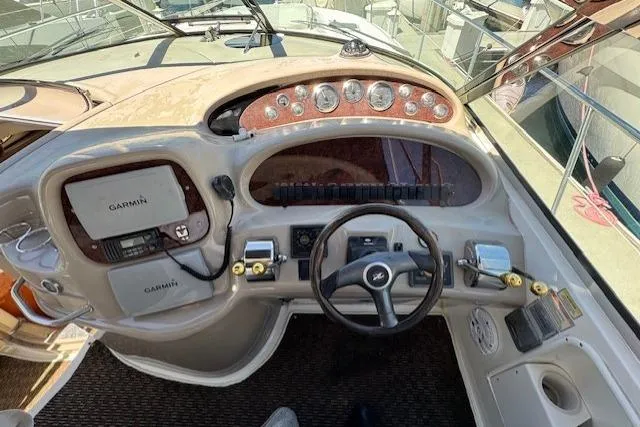 Slide: The Image of Cockpit of 2000 Sea Ray 410 Express Cruiser with Garmin navigation system. - 17