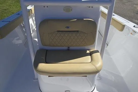 Slide: The Image of 2023 Sportsman Open 242 Center Console boat seat with beige upholstery. - 10