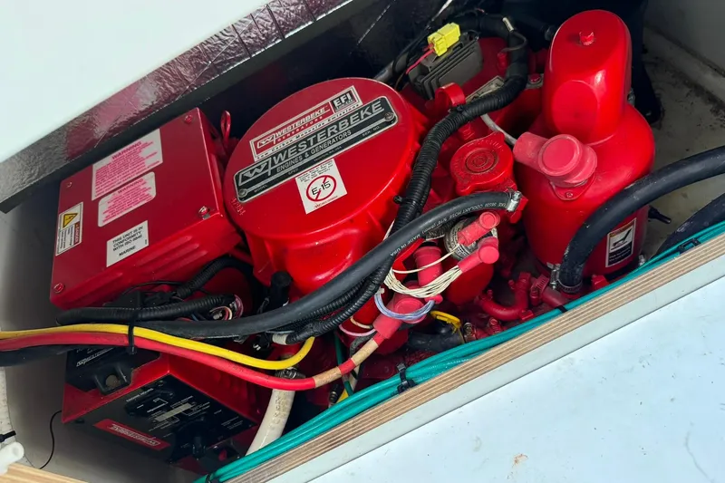 Slide: The Image of Engine compartment of a 2019 Jeanneau 895NC with Westerbeke generator. - 15