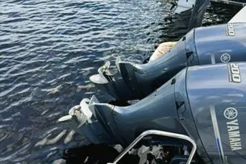 Slide: The Image of Twin Yamaha 200 outboard motors on a 2019 Jeanneau 895NC boat. - 6
