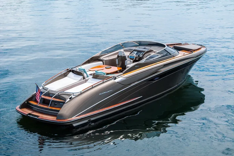 The Image of 2014 Riva Rivarama luxury yacht on calm water, showcasing sleek design and elegance. - 0