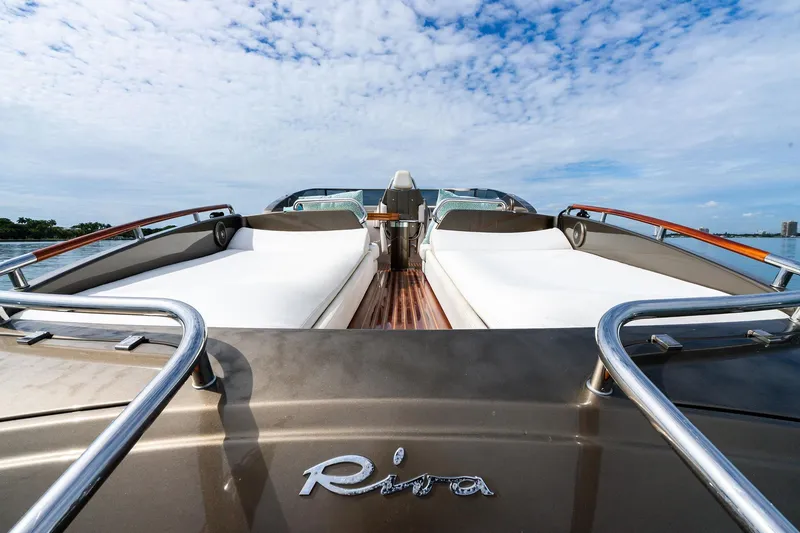 Slide: The Image of 2014 Riva Rivarama luxury yacht with sleek design and spacious sunbeds. - 13