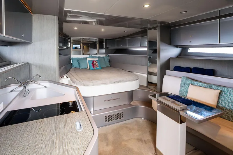Slide: The Image of Luxurious interior of a 2014 Riva Rivarama yacht with modern amenities and elegant design. - 21