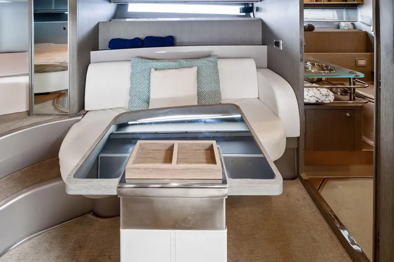 Slide: The Image of Luxurious interior of a 2014 Riva Rivarama yacht with elegant seating and modern design. - 23