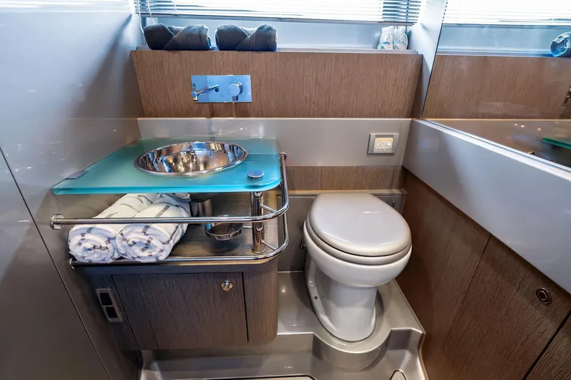 Slide: The Image of Luxurious 2014 Riva Rivarama yacht bathroom with modern sink and toilet. - 28