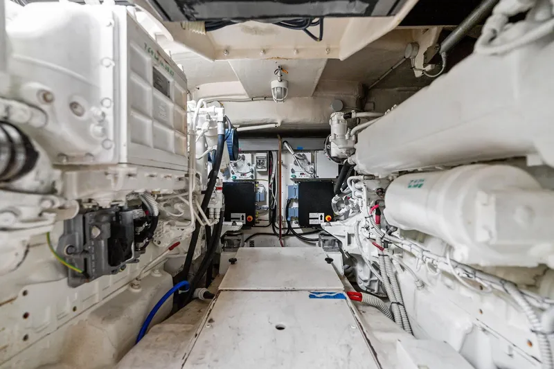 Slide: The Image of Engine room of a 2014 Riva Rivarama Super yacht, showcasing mechanical components. - 38