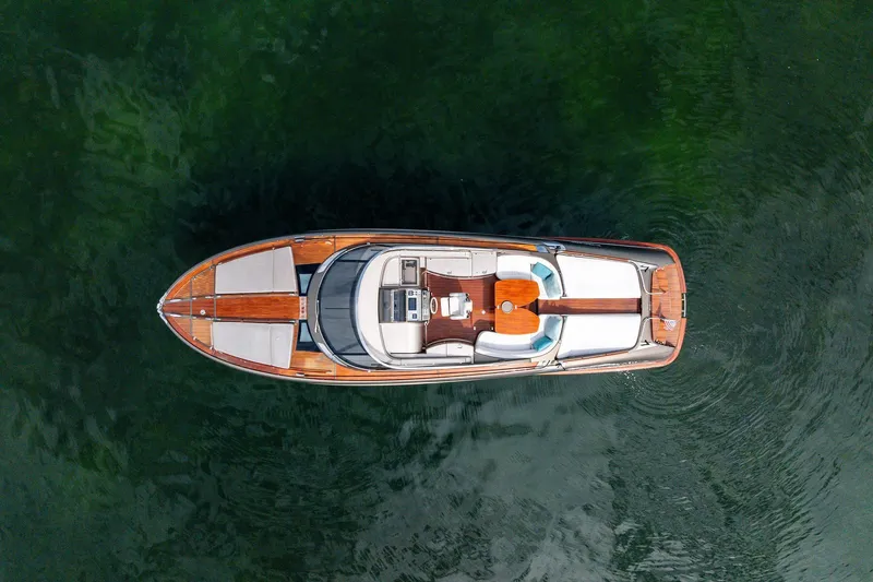 Slide: The Image of Aerial view of 2014 Riva Rivarama luxury yacht on calm water. - 6