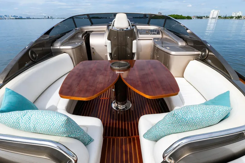 Slide: The Image of Luxurious 2014 Riva Rivarama yacht interior with elegant seating and wooden table. - 9