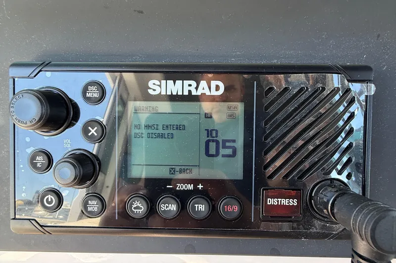 Slide: The Image of Throttle control of 2021 Axopar 28 WetBar boat, featuring start/stop button. - 17