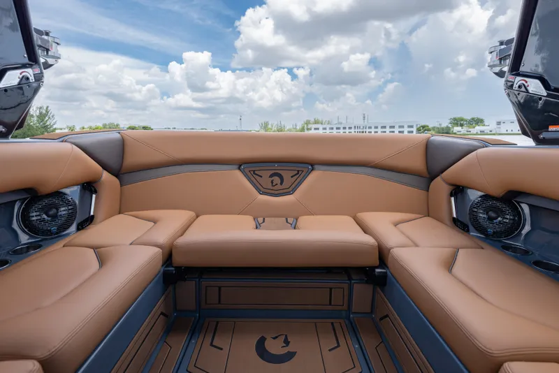 Slide: The Image of Luxurious interior of 2025 Centurion Nv233 boat with tan leather seating and modern design. - 19