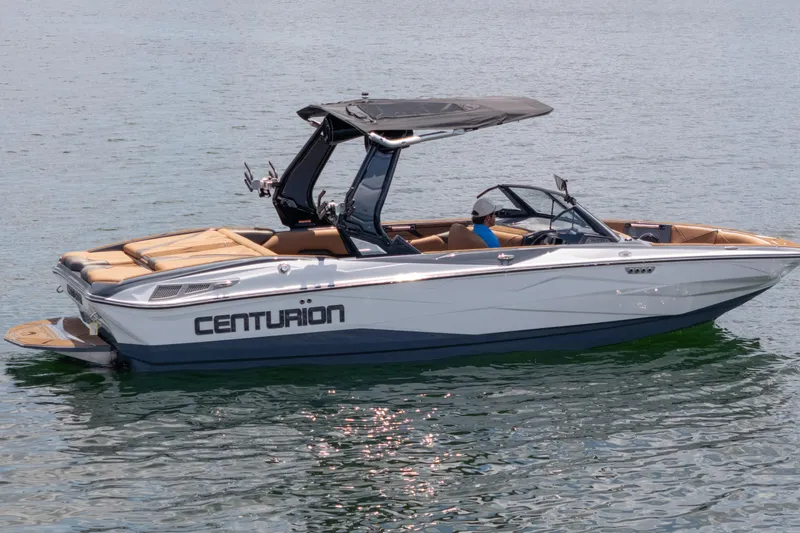 Slide: The Image of 2025 Centurion Nv233 boat on water, sleek design, luxury seating, modern features. - 28