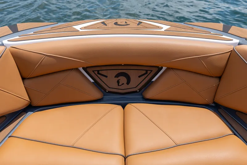 Slide: The Image of Luxurious tan leather seating on 2025 Centurion Nv233 boat, with stylish design details. - 8