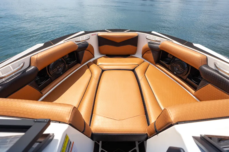 Slide: The Image of Luxurious interior of 2025 Supreme S220 boat with tan leather seating. - 12