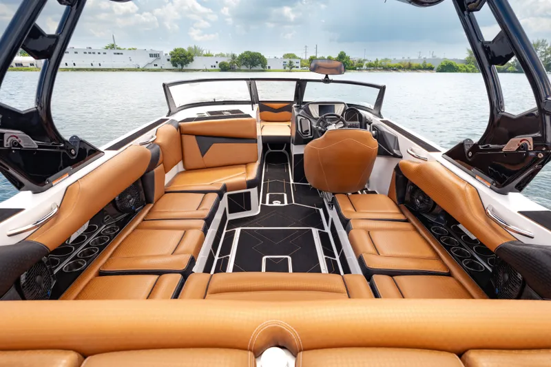 Slide: The Image of Luxurious interior of 2025 Supreme S220 boat with tan leather seating and modern design. - 4
