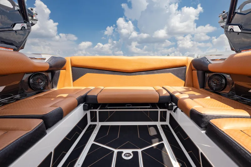 Slide: The Image of Luxurious interior of 2025 Supreme S220 boat with tan seating and modern design. - 8