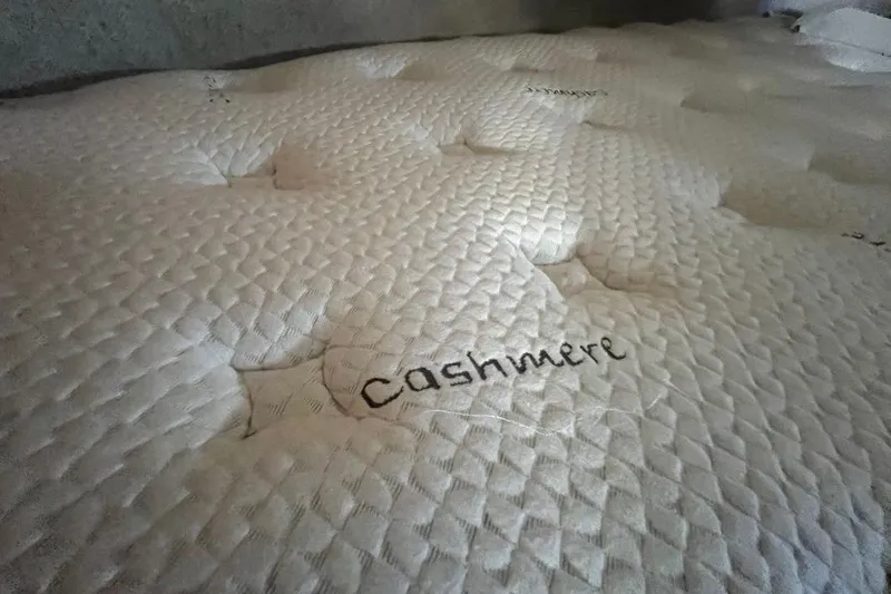 Slide: The Image of Luxurious cashmere mattress surface with textured pattern, highlighting comfort and elegance. - 103