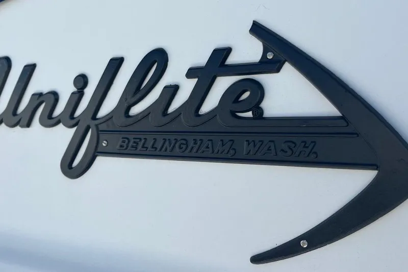 Slide: The Image of 1973 Uniflite Sport Fisher logo, Bellingham, Washington, black lettering on white background. - 11