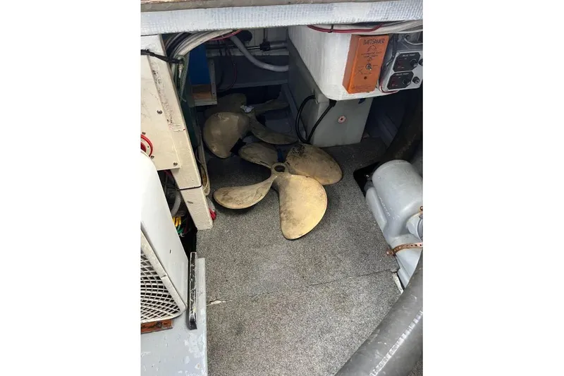 Slide: The Image of 1973 Uniflite Sport Fisher engine room with propeller and equipment. - 137