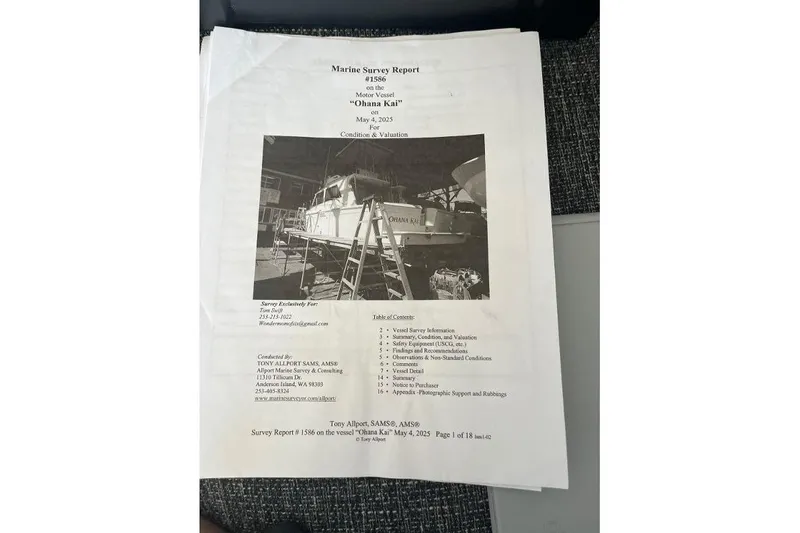 Slide: The Image of Marine survey report for 1973 Uniflite Sport Fisher, featuring vessel "Ohana Kai." - 144